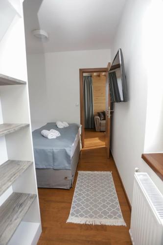 Nivalis Residenceにあるベッド