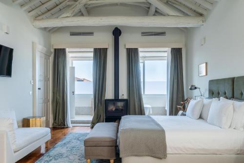 Un pat sau paturi într-o cameră la Casa do Cativo