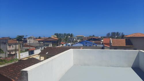 a view of a city from the roof of a building at Chapéu de Sol - Área Gourmet, TV, Internet, Roupas de Cama e Banho, Jardim, Horta e Pomar in Ilha Comprida