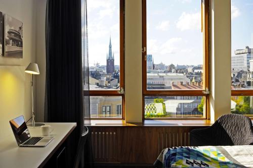 a hotel room with a view of the ocean at Scandic Norra Bantorget in Stockholm