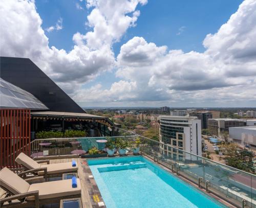 a view from the rooftop of a building with a swimming pool at Park Inn by Radisson, Nairobi Westlands in Nairobi