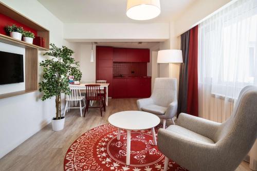 TV o dispositivi per l'intrattenimento presso Park Inn by Radisson Bucharest Hotel & Residence