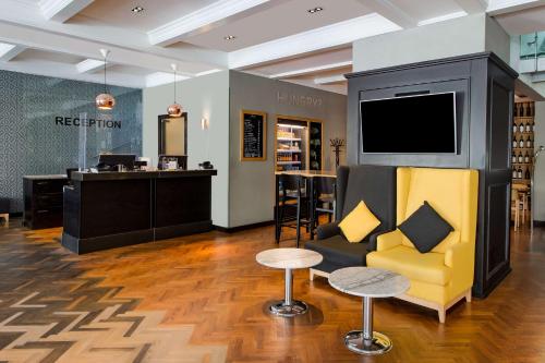 The lobby or reception area at Park Inn by Radisson Bucharest Hotel & Residence