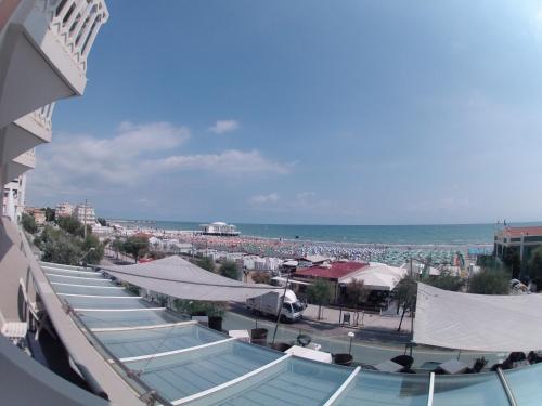 a view of a beach from a building at City Hotel in Senigallia