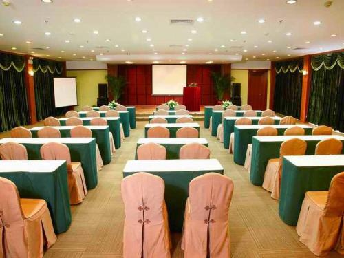 a large room with tables and chairs in it at Shenzhen Kaili Hotel, Guomao Shopping Mall in Shenzhen