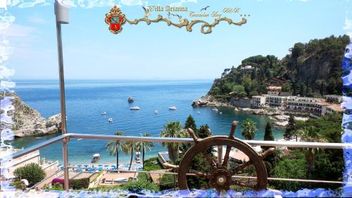 a view of a beach with boats in the water at Villa Arianna B&B in Taormina