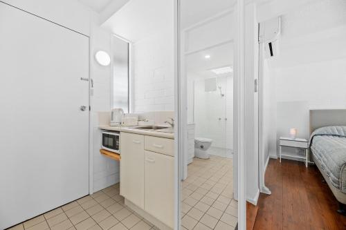 Η κουζίνα ή μικρή κουζίνα στο The Harrington Serviced Apartments