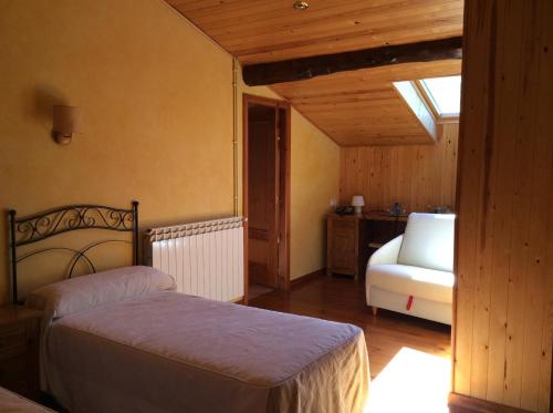 Postel nebo postele na pokoji v ubytování Hotel La Ribera