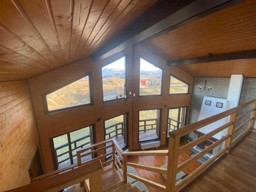 a view from the top of a house with windows at Sirnea Chalet in Şirnea