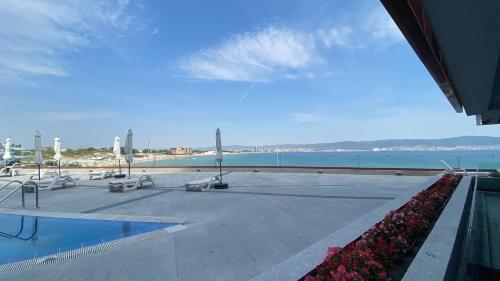 a swimming pool with a view of the ocean at PARADISO 'В' 107 Private Cozy Studio NESSEBAR in Nesebar