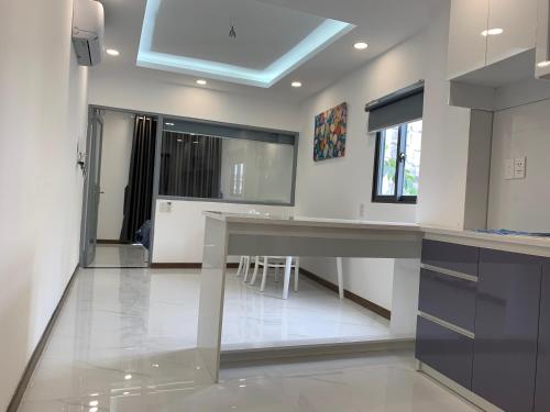 Η κουζίνα ή μικρή κουζίνα στο Smiley Apartment Quận 2
