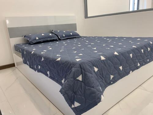 Ένα ή περισσότερα κρεβάτια σε δωμάτιο στο Smiley Apartment Quận 2