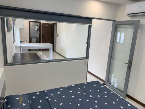 Ένα ή περισσότερα κρεβάτια σε δωμάτιο στο Smiley Apartment Quận 2