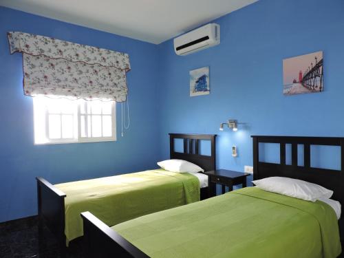 Postel nebo postele na pokoji v ubytování Casa La Hoya, en Tijarafe