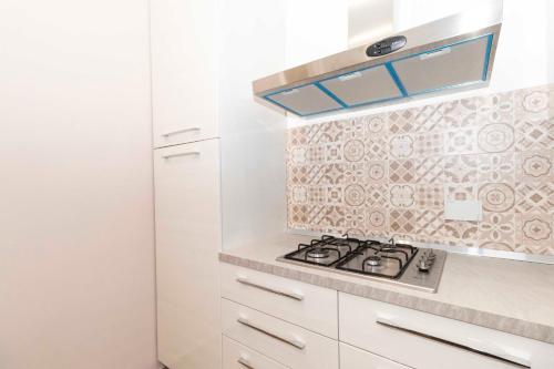 Kuchyň nebo kuchyňský kout v ubytování Bright & Functional Flat Lingotto
