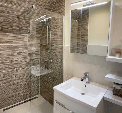 Kúpeľňa v ubytovaní Zen Apartman