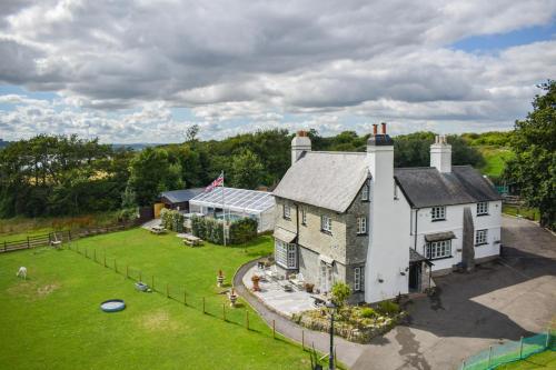 an aerial view of a house with a yard at St Annes House in Plymouth