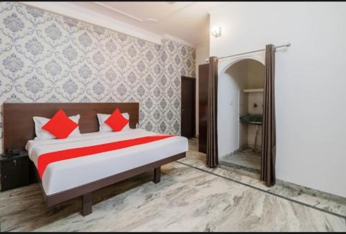 En eller flere senge i et værelse på Welcome Guest Accommodation