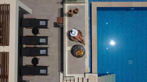 Фотография из галереи Nerea SeaFront Villa, a Pristine Retreat, By ThinkVilla в Акротири