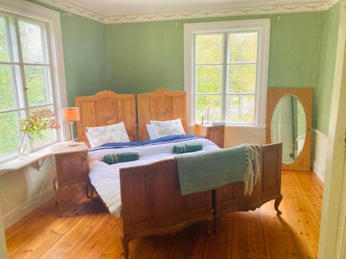 Ένα ή περισσότερα κρεβάτια σε δωμάτιο στο 5 bed country home only 2 hrs north of Stockholm