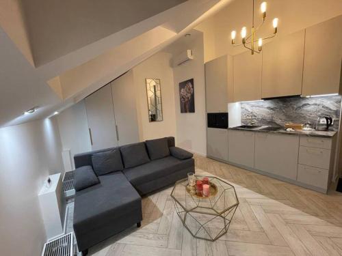 Posezení v ubytování E.M. Studio In City Center