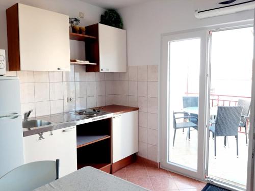 Kuchyňa alebo kuchynka v ubytovaní Apartments Tomislav Mamic