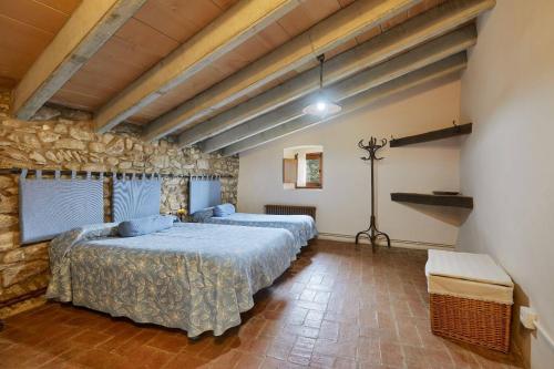 Säng eller sängar i ett rum på Can Soler de Merlant