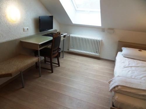 Voodi või voodid majutusasutuse Hotel Linnert toas