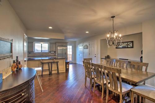 a kitchen and dining room with a table and chairs at House with Game Room Less Than 3 Mi to Wine Tastings! in Clarkdale