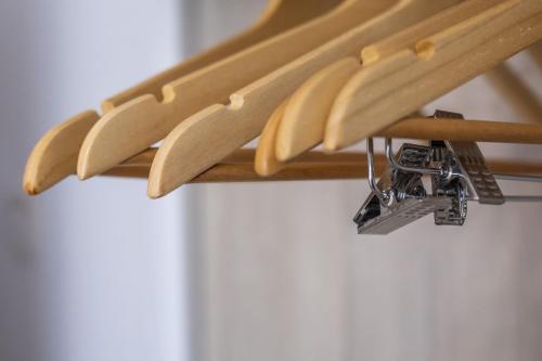 a group of surfboards hanging on a rack at Hotel Sunna Benicassim in Benicàssim