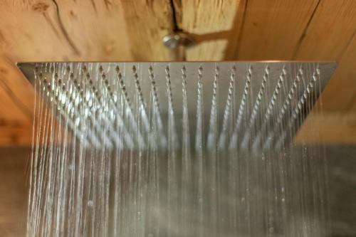 a close up of a metal shower head at The VIEW - KAPRUN in Kaprun