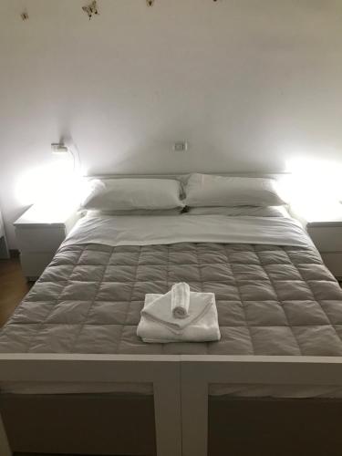 Ένα ή περισσότερα κρεβάτια σε δωμάτιο στο B&B APARTAMENTS Milano Bocconi
