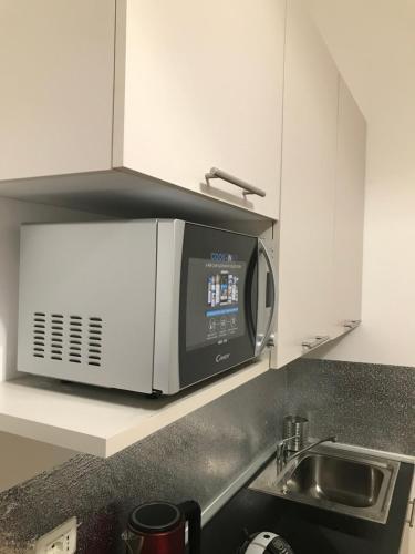 Кухня или мини-кухня в B&B APARTAMENTS Milano Bocconi
