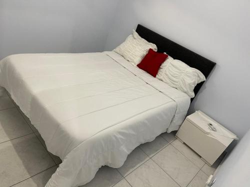 Ένα ή περισσότερα κρεβάτια σε δωμάτιο στο Les Villas Sarah