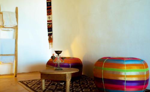 Ein Sitzbereich in der Unterkunft L'oasis Du Bonheur