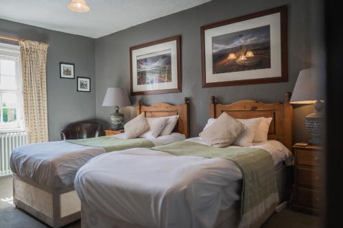 Katil atau katil-katil dalam bilik di The Old Hall Inn