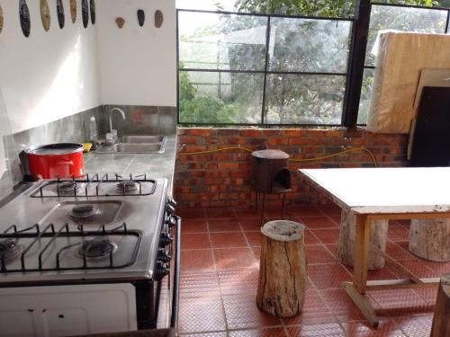 Köök või kööginurk majutusasutuses Glamping Bosque del Colibri