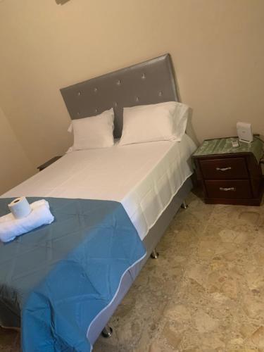 Ένα ή περισσότερα κρεβάτια σε δωμάτιο στο Marbella1