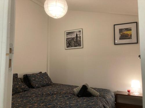 Ένα ή περισσότερα κρεβάτια σε δωμάτιο στο Appartement Mozart