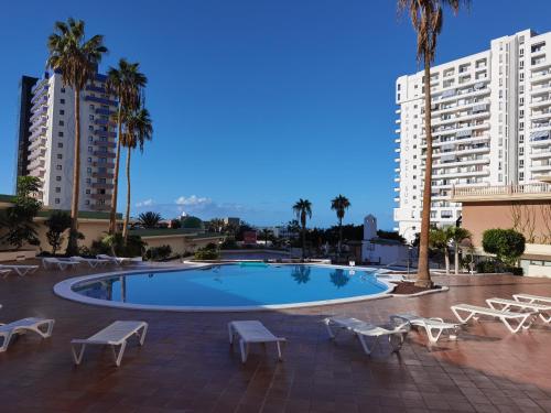 Bazén v ubytování Sun Paradise Apartment nebo v jeho okolí