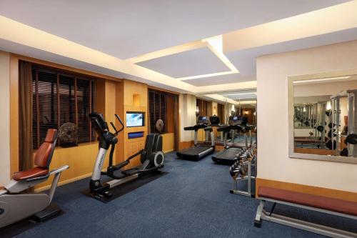 a gym with cardio equipment in a hotel room at Park Plaza Beijing Wangfujing in Beijing