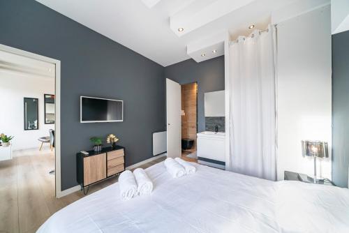 Säng eller sängar i ett rum på Frontière Monaco, Appartement Rénové Entièrement - AG