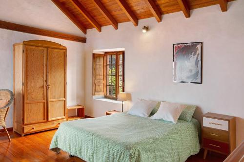 Кровать или кровати в номере Las Guindas