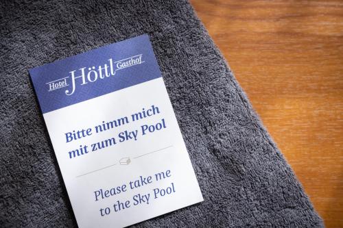 a ticket on the side of a table at Hotel-Gasthof Höttl in Deggendorf