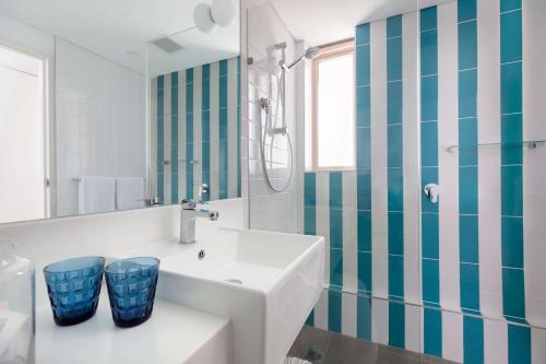 Ванная комната в Rydges Cronulla Beachside