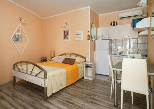 Kuchyňa alebo kuchynka v ubytovaní Apartment Home Sweet Home