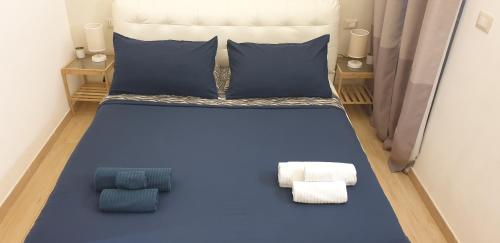 A bed or beds in a room at Don Fulippu Home to city center