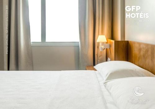 Postel nebo postele na pokoji v ubytování Apto no Salinas Exclusive Resort