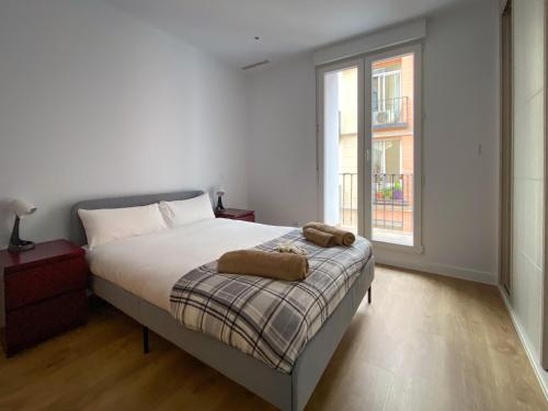 Postel nebo postele na pokoji v ubytování Sol Apartamentos Madrid Centro