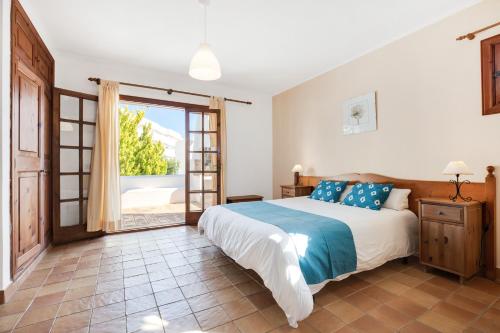 Postel nebo postele na pokoji v ubytování Villa Casa Angel